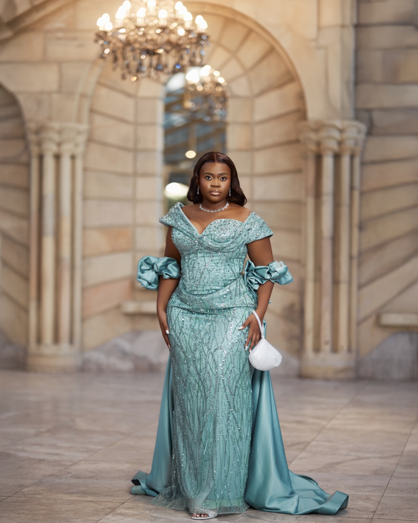 Matric dance portrait in a teal gown photographed on location